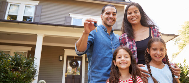 Family with new home keys