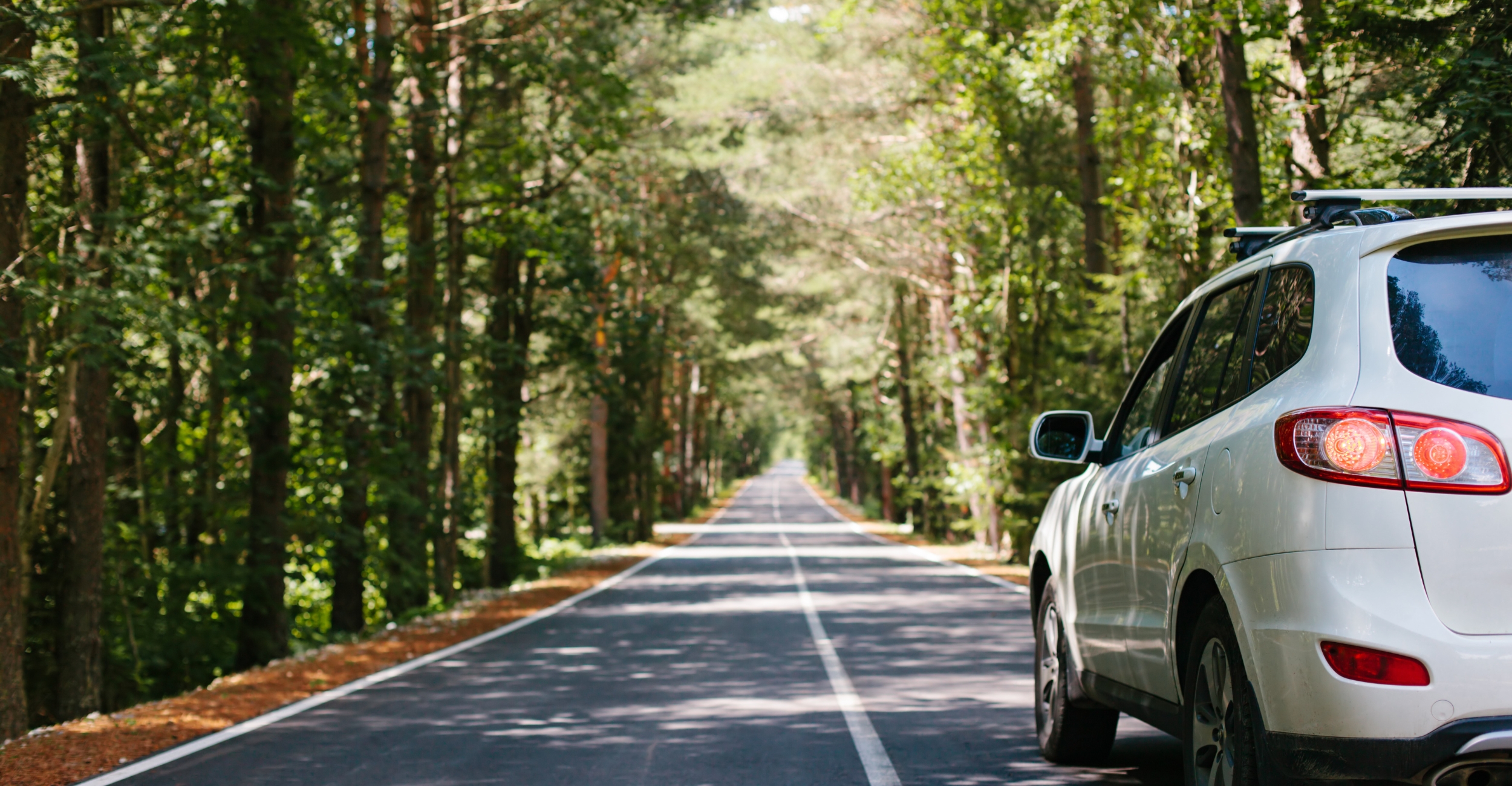 Car driving down the road