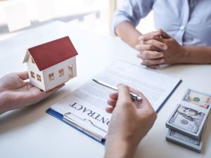 person using their tax refund to help buy their home