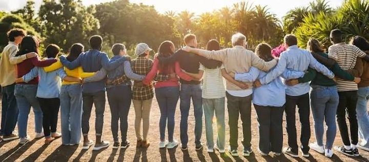 Neighbors standing arm in arm